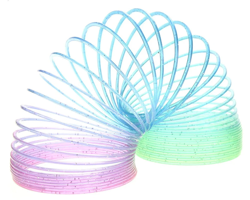 Stacked set of rainbow magic springs in vibrant colors, ideal for interactive play sessions.