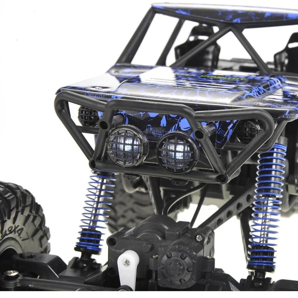 Front view of 1/10 rally RC car showing powerful headlights and rugged design.