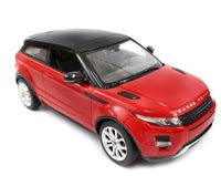 Closeup of the front design of the red Range Rover RC car - realistic headlights and grill.