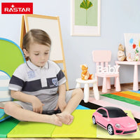 Child Playing with RC Volkswagen Beetle - A fun and engaging remote-controlled Volkswagen Beetle for children