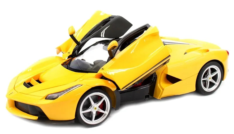 Yellow toy sports car on a white background