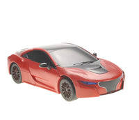Red toy car on a white background