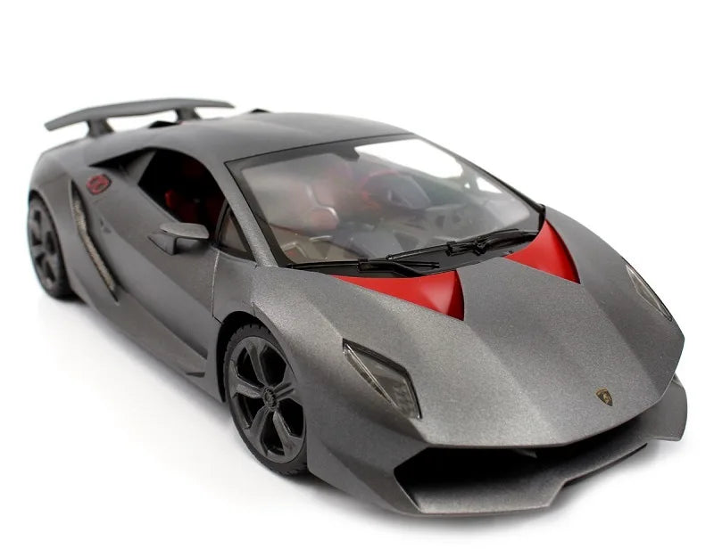 Model of a sports car with a gray body and red accents on a white background