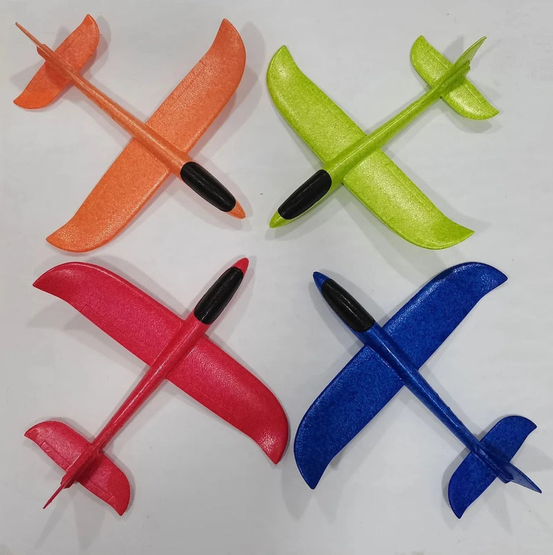 Set of four colorful EPP airplane toys in orange, green, red, and blue, lightweight and easy to fly