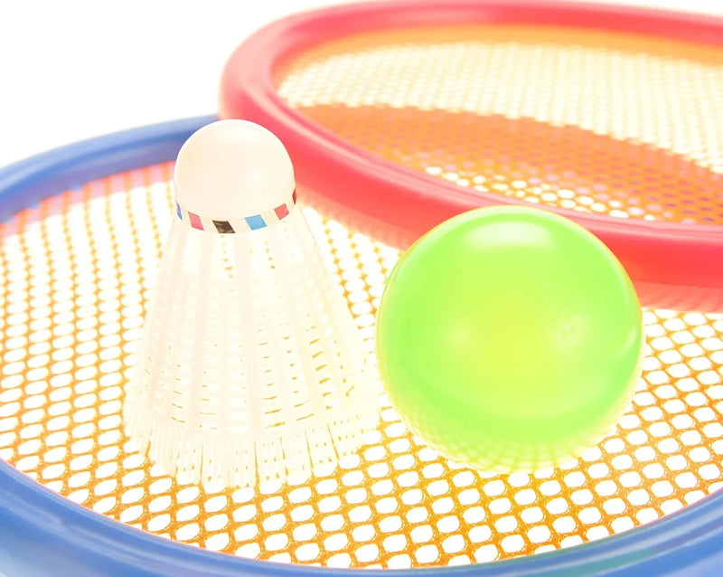 Shuttlecock and green ball on a colorful toy racket set for kids