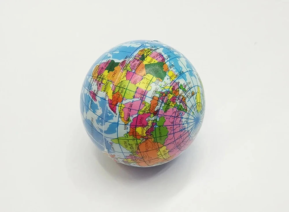 Close-up of a single globe toy ball with a colorful world map design.