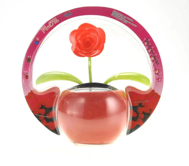 Solar flower toy in retail packaging, solar-powered flower pot toy for cars, desks, and gifts.