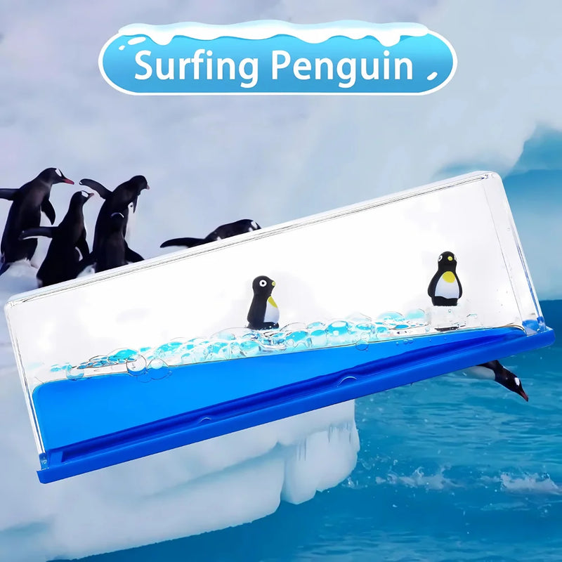 Penguin sensory toy with a surfing theme, featuring floating penguins in blue liquid for calming effects