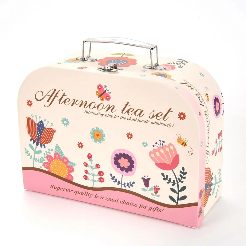 Close-up of the metal handle on a tea party set case for little girls, showcasing quality and durability in kids' tea sets