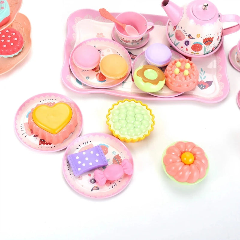 Detailed look at play treats and plates in a kids' tea set for little girls, perfect for a toddler's tea party