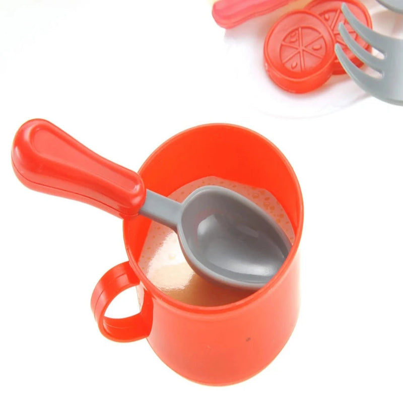 Toy cup with spoon for pretend play, part of the kitchen breakfast stove playset for kids.