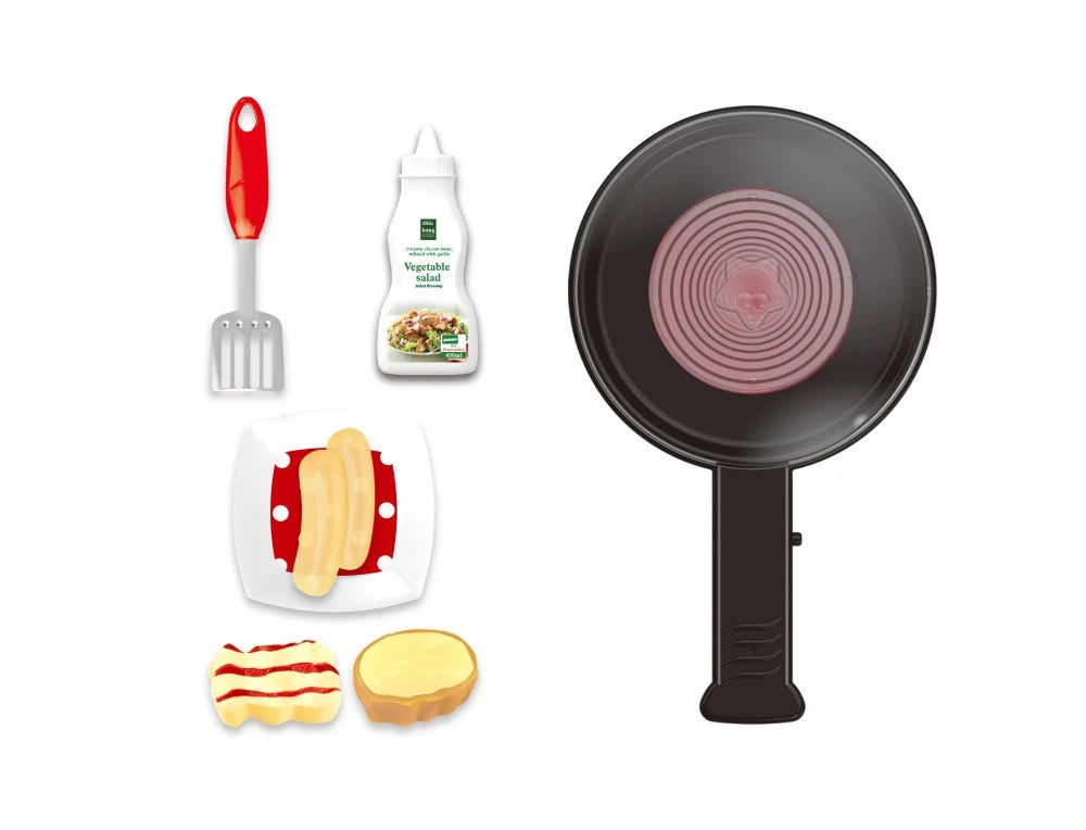 Complete toy cooking set with frying pan, spatula, salad dressing bottle, and food items