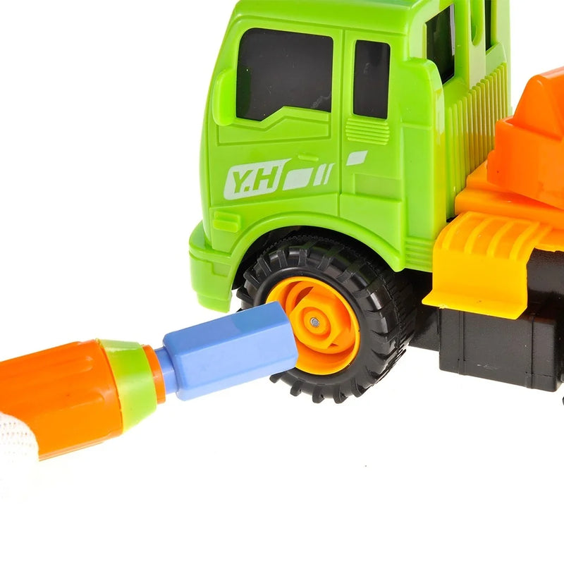 Assembling the wheel of a toy excavator truck using a screwdriver, ideal for kids' play and learning