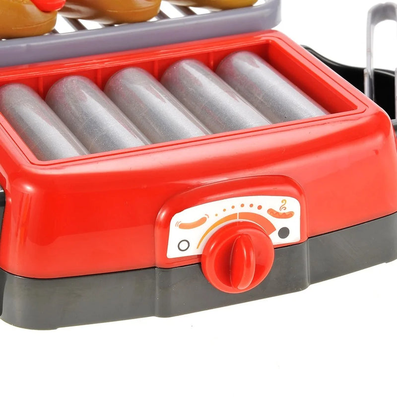 Close-up view of the toy hotdog grill set with adjustable knob and roller detail