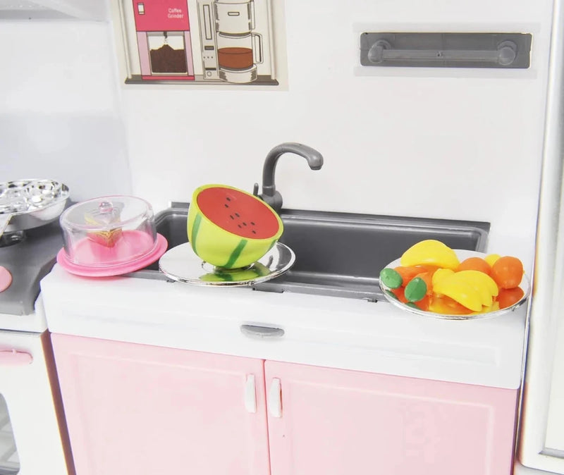 Toy kitchen sink set with play watermelon and food items on tray.