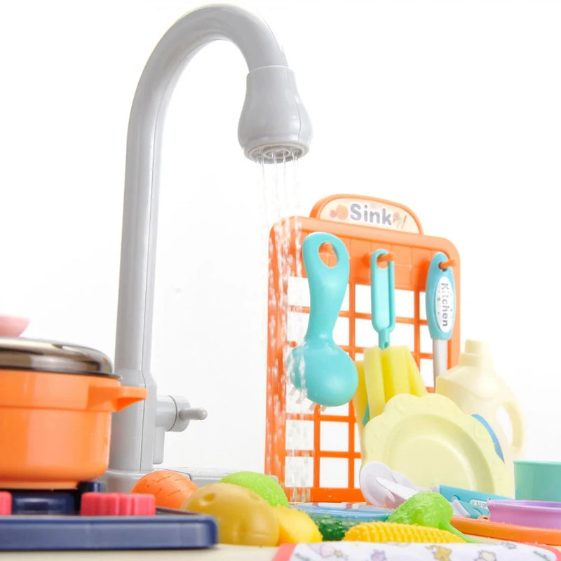 Toy kitchen utensils neatly hanging on the sink rack, enhancing pretend play experience for kids.