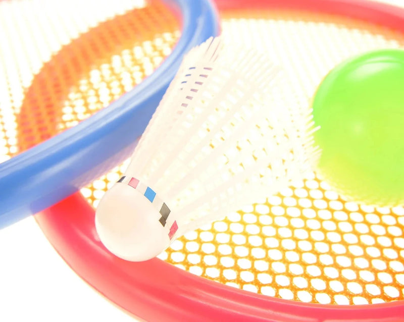 Close-up of a toy shuttlecock on a colorful racket set designed for children