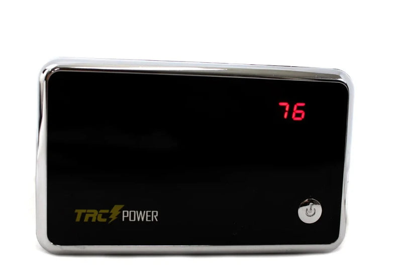 Front view of the TRC Power Bank with LED display showing battery level, sleek black design.