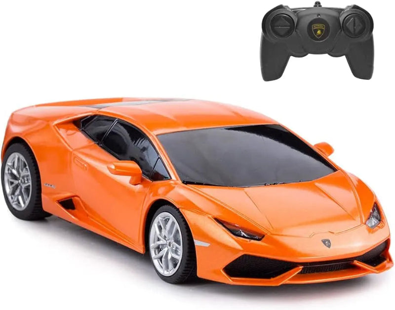 Orange toy car with a remote control on a white background