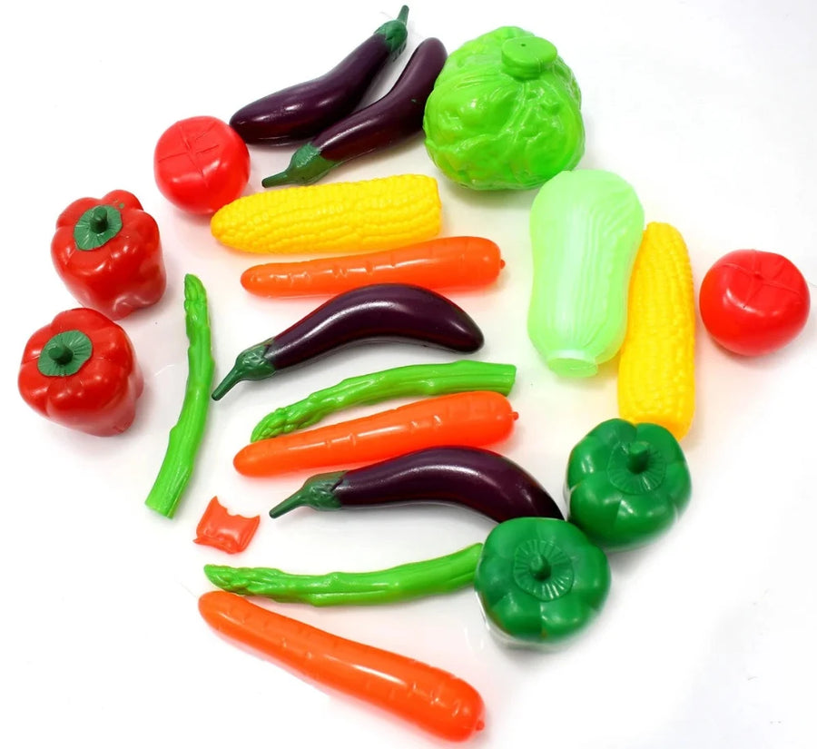  Colorful assortment of toy vegetables including corn, carrots, and tomatoes from the vegetable play set for toddlers.