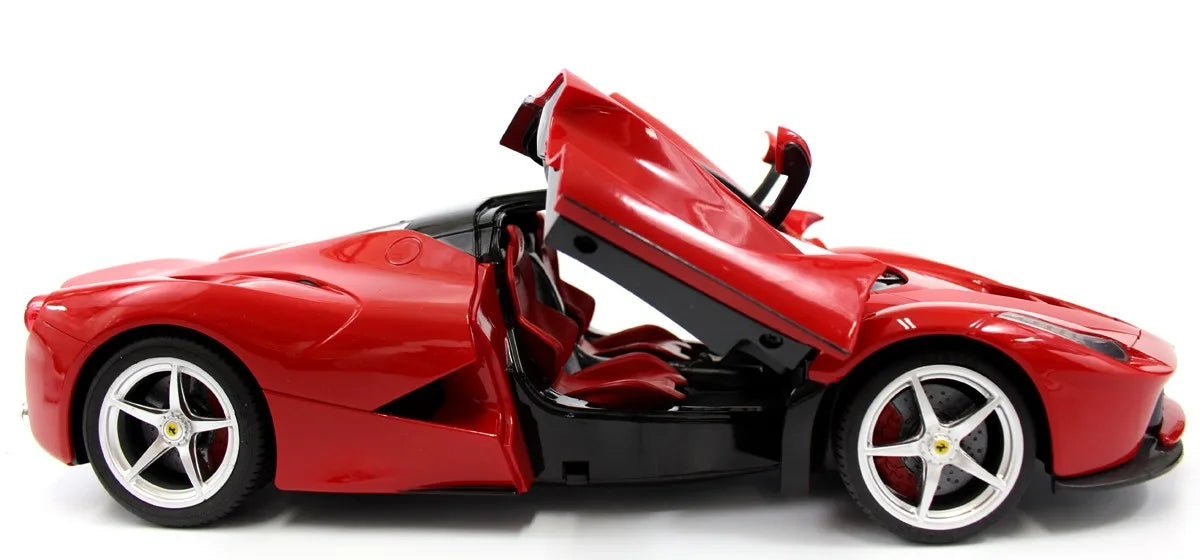 Red toy car with open doors on a white background