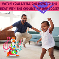 Baby dancing along with the hip hop goose toy, creating a fun playtime moment