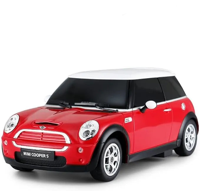 Red toy car with a white roof and black steering wheel remote control on a white background