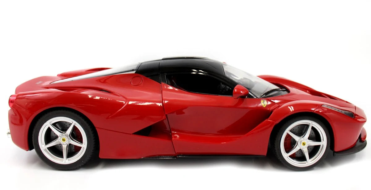 Red sports car model on a white background