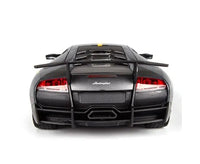 Back view of a black Lamborghini sports car on a white background