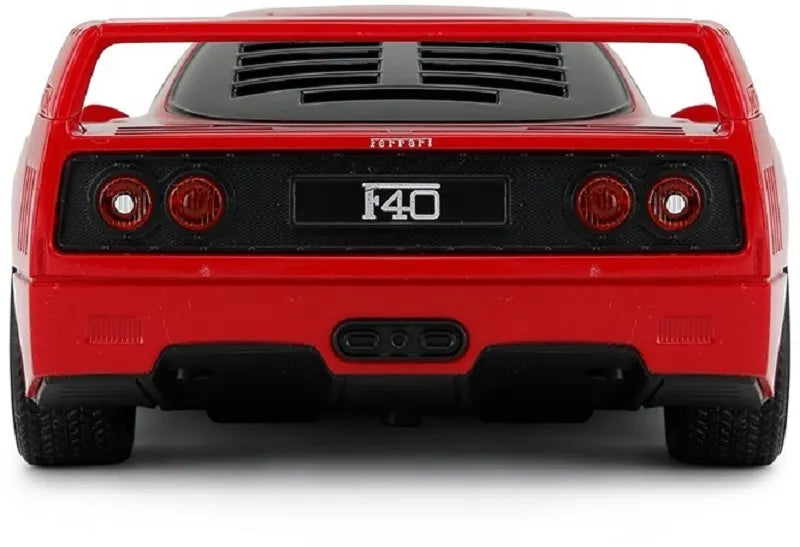Back view of a red Ferrari F40 model car on a white background