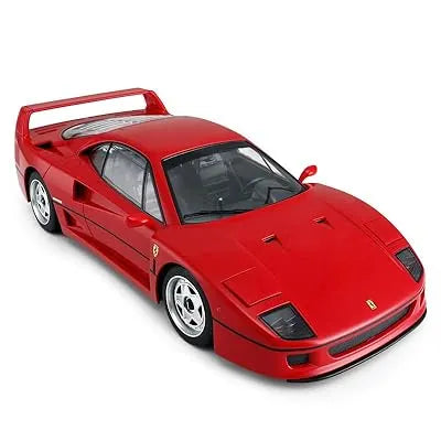 Red Ferrari model car on a white background