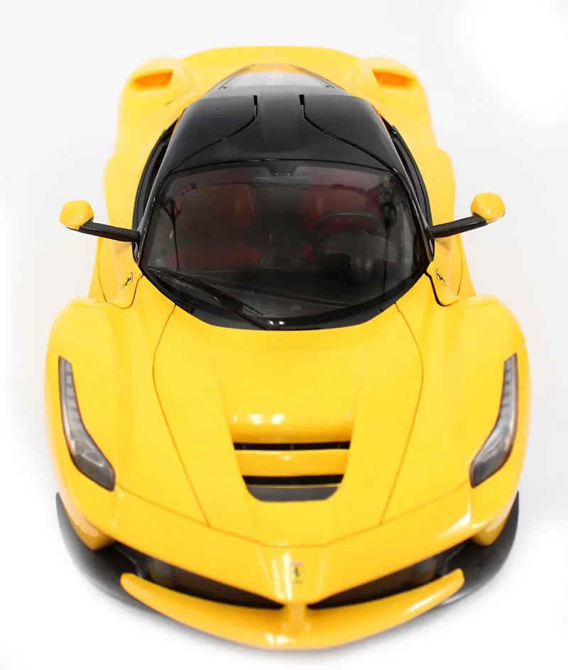 Yellow toy car with a helmet-like design on a white background
